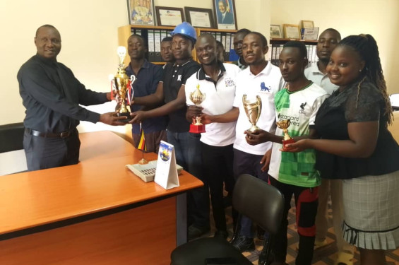 Trophy parade to the office of Principal by the Champions water department